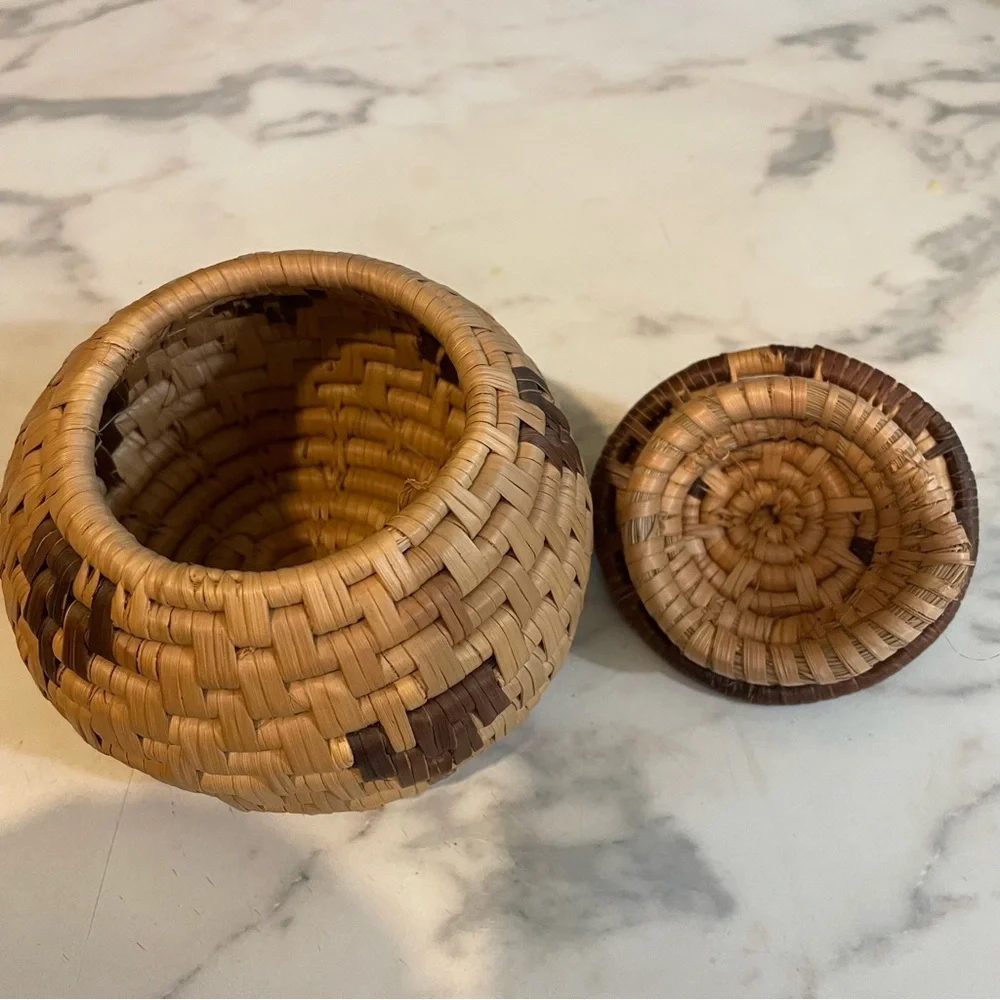 Miniature Hand Woven basket with lid. 4 1/2 inches x 4 1/2 inches.
